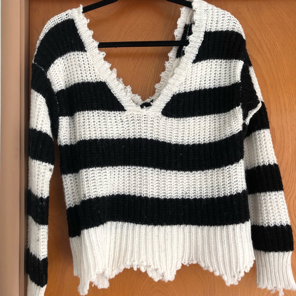 Black and white striped distressed sweater